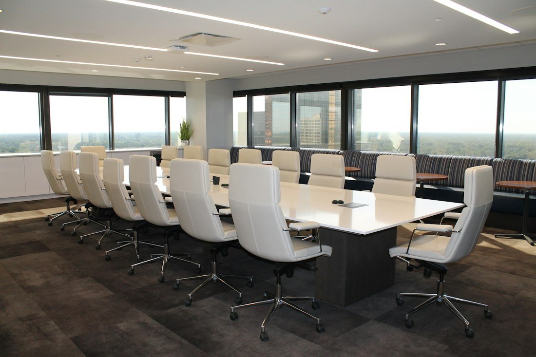 Executive boardroom with a skyline view used for capital partner reviews