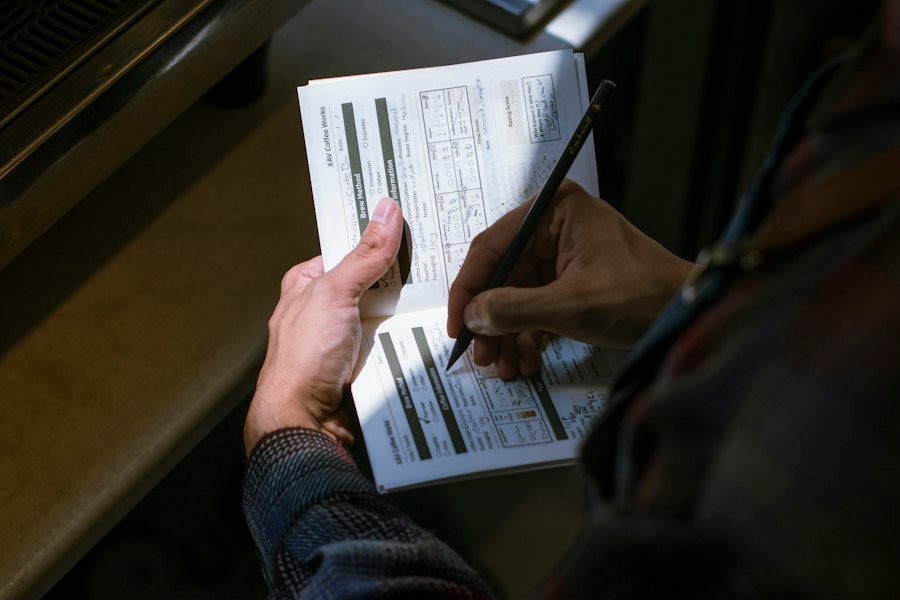 A person reading through a printed case study